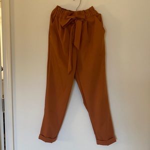 Burnt orange paper bag trouser